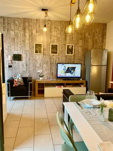 TV a/nebo společenská místnost v ubytování Bnbook Blue River -2 bedrooms and private parking