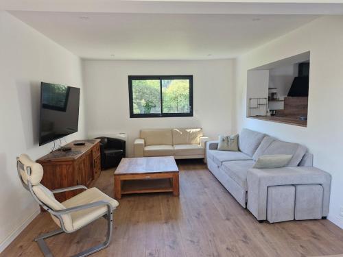 Posezení v ubytování Maison au calme