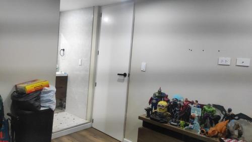 a room with a table with action figures on it at Departamento para PERUMIN AREQUIPA in La Apacheta
