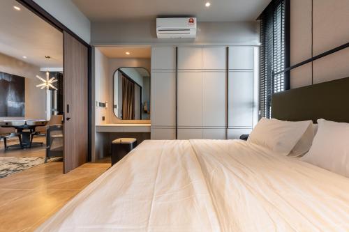 Postel nebo postele na pokoji v ubytování 8 Pax Antara Genting Suites by Silaslee