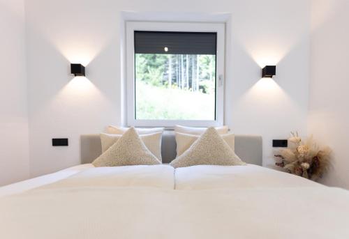 Ένα ή περισσότερα κρεβάτια σε δωμάτιο στο Apartment Aemilia-Paulina