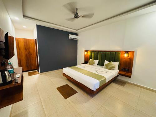 Katil atau katil-katil dalam bilik di Rashiva Resort