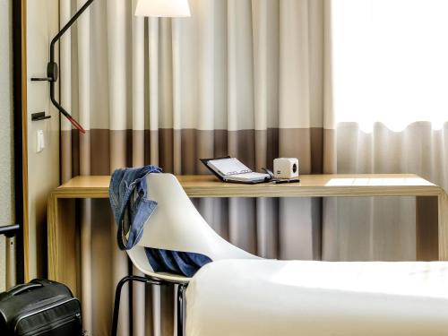Postelja oz. postelje v sobi nastanitve ibis Berlin Mitte