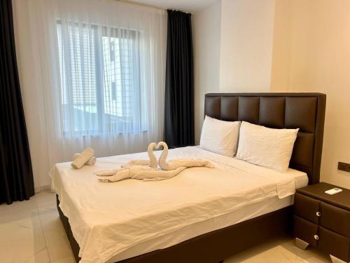 Postel nebo postele na pokoji v ubytování Salam Residence 2 - Woman Pool - Alanya Experience