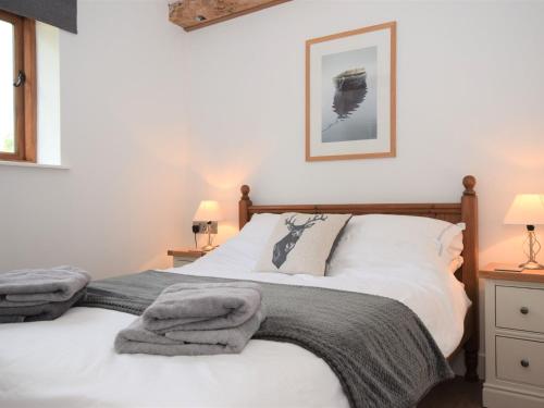 Ένα ή περισσότερα κρεβάτια σε δωμάτιο στο 3 Bed in Brecon 88249