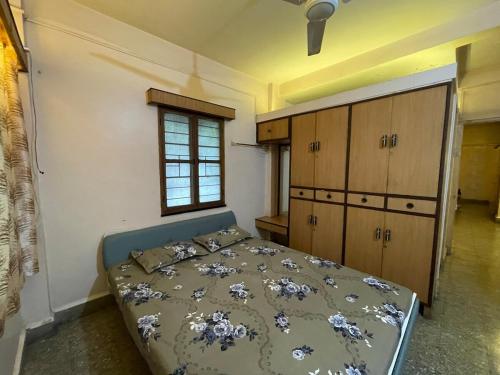 Ένα ή περισσότερα κρεβάτια σε δωμάτιο στο Caramel 2bhk MIT, Kothrud Main City