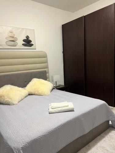 Postel nebo postele na pokoji v ubytování Artley Home Ladispoli