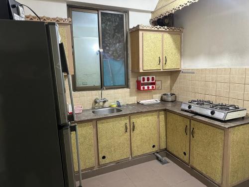 Η κουζίνα ή μικρή κουζίνα στο Guesthouse in Bhurban Murree