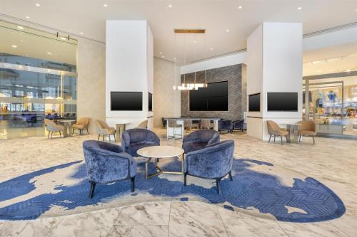 Телевизор и/или развлекательный центр в Hilton Grand Vacations Club Elara Center Strip Las Vegas