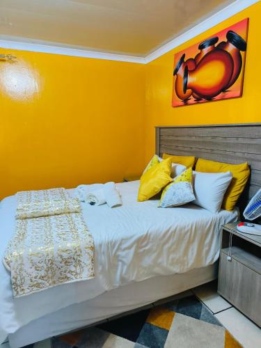 Postel nebo postele na pokoji v ubytování Acama Guest House