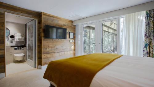 Ένα ή περισσότερα κρεβάτια σε δωμάτιο στο Hotel Indigo - Bath by IHG