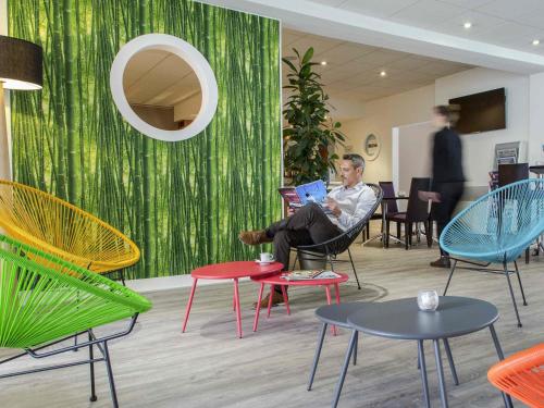 Novotel Perpignan Nord Rivesaltesにあるシーティングエリア
