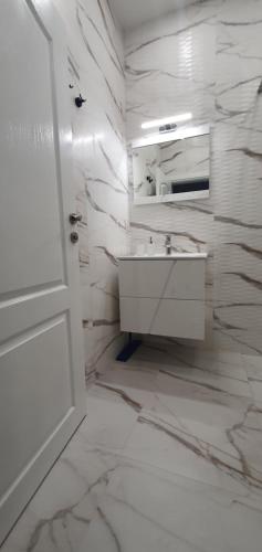 Koupelna v ubytování SUPERsonicondo