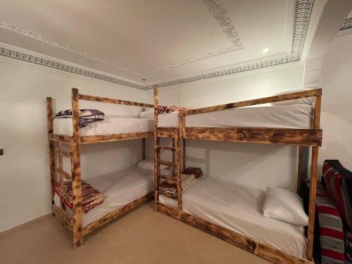 Кровать или кровати в номере Heaven Surf Morroco
