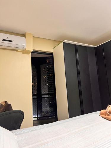 Llit o llits en una habitació de Apartamento Belém