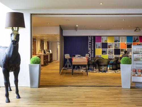 Coin salon dans l'établissement ibis Styles Lorient Caudan