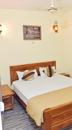 Postel nebo postele na pokoji v ubytování Sadhna Sadan Homestay