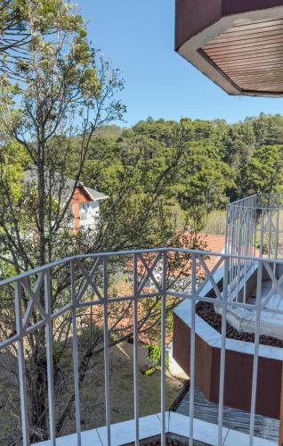 Balcon ou terrasse dans l'établissement Pousada Vilage Inn Capivari Campos do Jordão