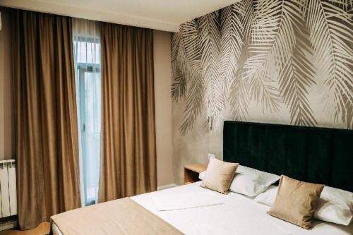 Postel nebo postele na pokoji v ubytování Casa Dragan