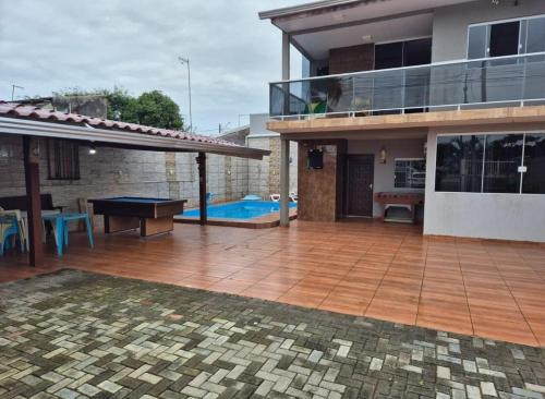 Kolam renang di atau dekat dengan Casa longa temporada e curta !