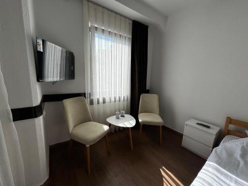 Postel nebo postele na pokoji v ubytování LIMMARE Rooms