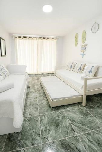 Χώρος καθιστικού στο Coral APTS Al Frente de la playa