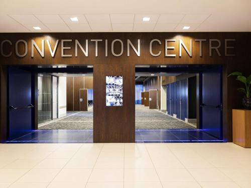 an entrance to the convention centre in a building at Novotel Amsterdam City in Amsterdam