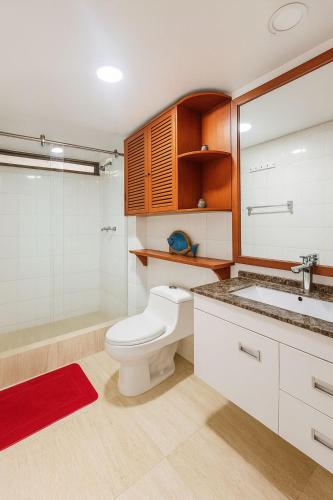Ένα μπάνιο στο Coral APTS Al Frente de la playa