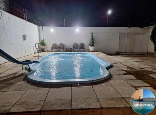 Πισίνα στο ή κοντά στο Flat House Veraneio