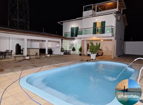 Πισίνα στο ή κοντά στο Flat House Veraneio