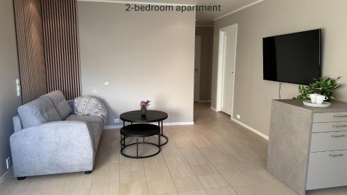 TV a/nebo společenská místnost v ubytování Ersfjord Villa Apt