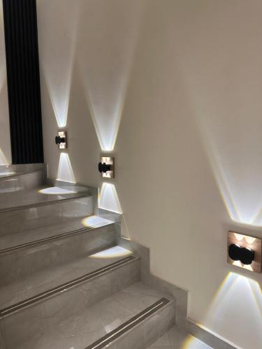 a set of stairs with lights on them at Hotel En Chia BIBA LIFE in Chía