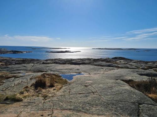 a view of the ocean from a rocky beach at 4 person holiday home in KUNGSHAMN-By Traum in Kungshamn