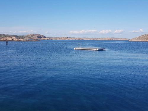 a dock in the middle of a large body of water at 4 person holiday home in KUNGSHAMN-By Traum in Kungshamn