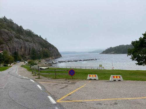 a road next to a body of water at 5 person holiday home in MUNKEDAL-By Traum in Munkedal