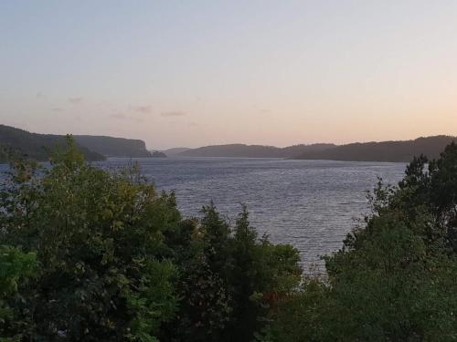 a view of a large body of water with trees at 5 person holiday home in MUNKEDAL-By Traum in Munkedal