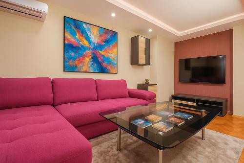 Televisyen dan/atau pusat hiburan di Ivy Central Apartment