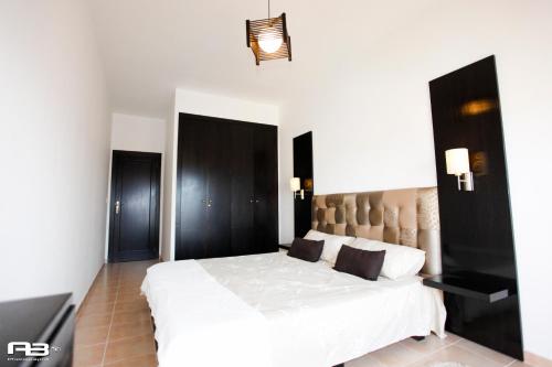 Postel nebo postele na pokoji v ubytování Appartement Résidence Alwaha Saidia