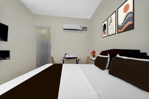TV a/nebo společenská místnost v ubytování Hotel O MPS Lodge