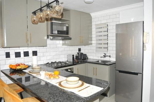 Dapur atau dapur kecil di Gardenview Luxe Retreat