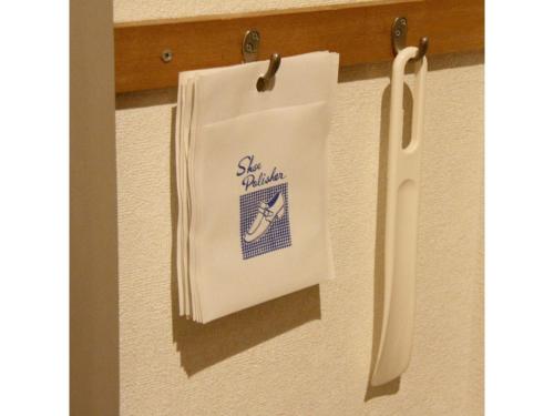 a towel hanging on a towel rack on a wall at Smile Hotel Tokyo Shinkoiwa - Vacation STAY 33628v in Tokyo