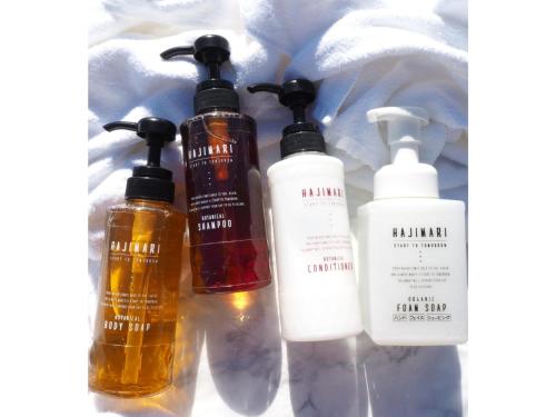 a group of four bottles of hair products in a box at Smile Hotel Tokyo Shinkoiwa - Vacation STAY 82160v in Tokyo
