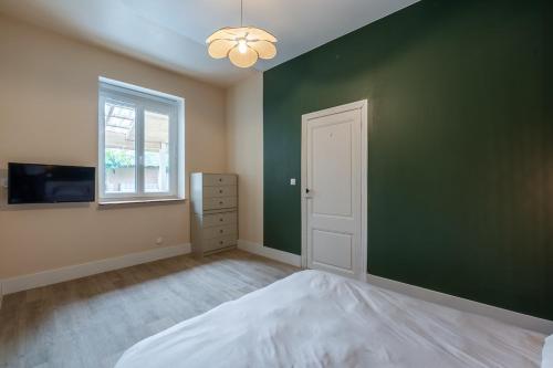 Postel nebo postele na pokoji v ubytování Sublime appartement avec SAP et grand extérieur