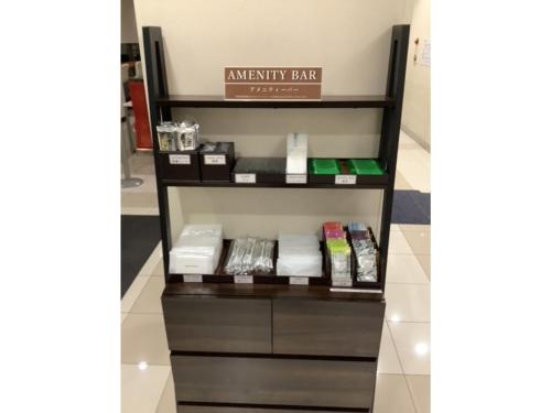 a shelf with products on it in a store at Smile Hotel Sakurambo Higashine - Vacation STAY 30008v in Higashine