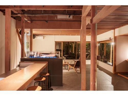 an open kitchen and dining room with wooden beams at Keyakizaka - Vacation STAY 12550v in Ogi