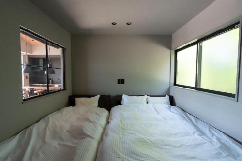 En eller flere senge i et værelse på Fujinomiya - House - Vacation STAY 20038