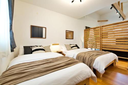 Postel nebo postele na pokoji v ubytování ZA103 Almond Ishigaki - Vacation STAY 27120v