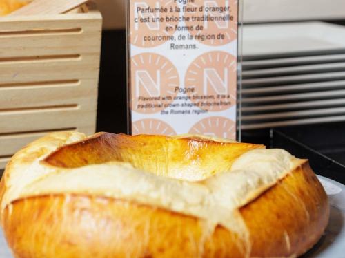a loaf of bread sitting on top of a table at ibis Valence Sud in Valence