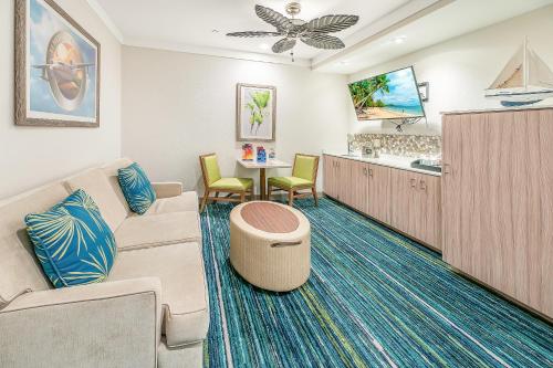 a waiting room with a couch and a table at Margaritaville Resort Gatlinburg in Gatlinburg