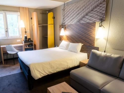 Cama o camas de una habitación en ibis Compiegne